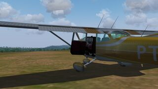 PT-IAO on a soft dirt runway