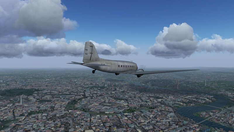 File:Douglas DC-3 over Kraków.jpg
