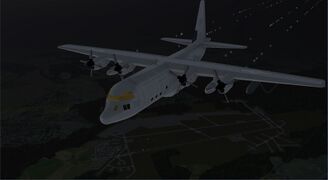 A C-130 overflying Ramstein AB at twilight.