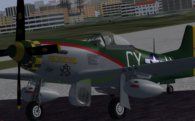 Screen shot showing new droop tanks, bomb racks, propeller and part of the K-14A gun sight.