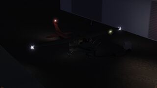 aircraft sitting in the dark, all lights on