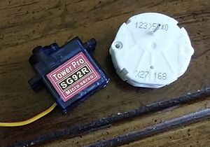 Compare size of automotive stepper motor vs the micro R/C servo