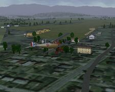 South approach to runway #36 with the houses and hangars