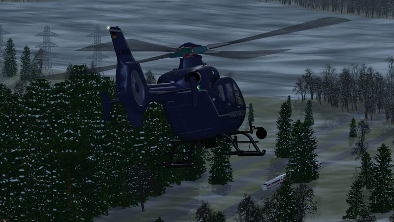 File:EC135 Chasing trains.jpg